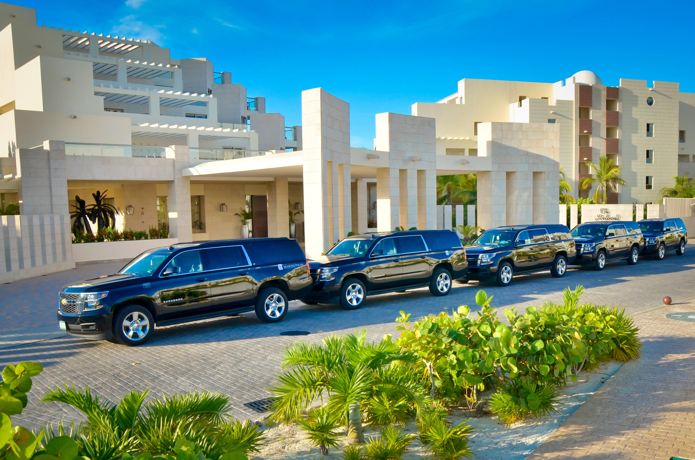 Transport from Cancun International Airport to your hotel in a luxury SUV