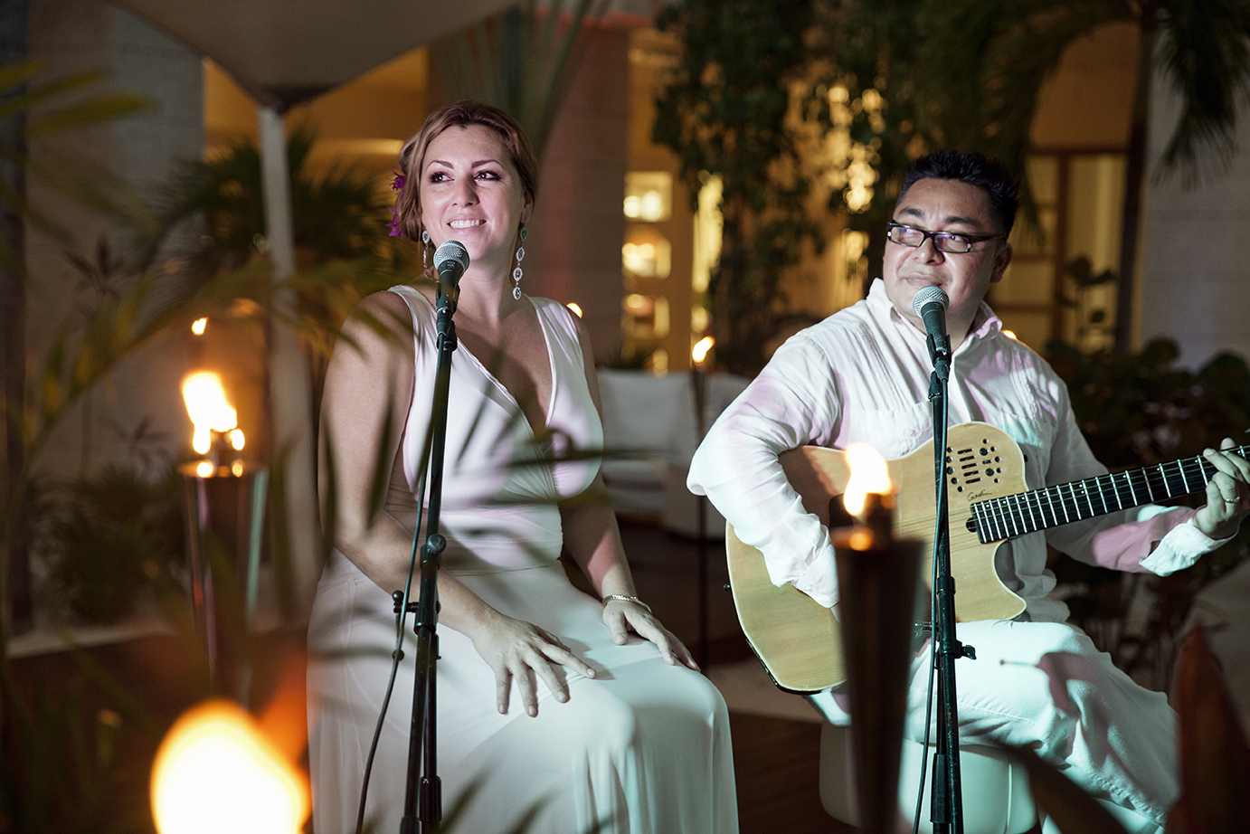 Claudia Treviño singing a song at Beloved Playa Mujeres