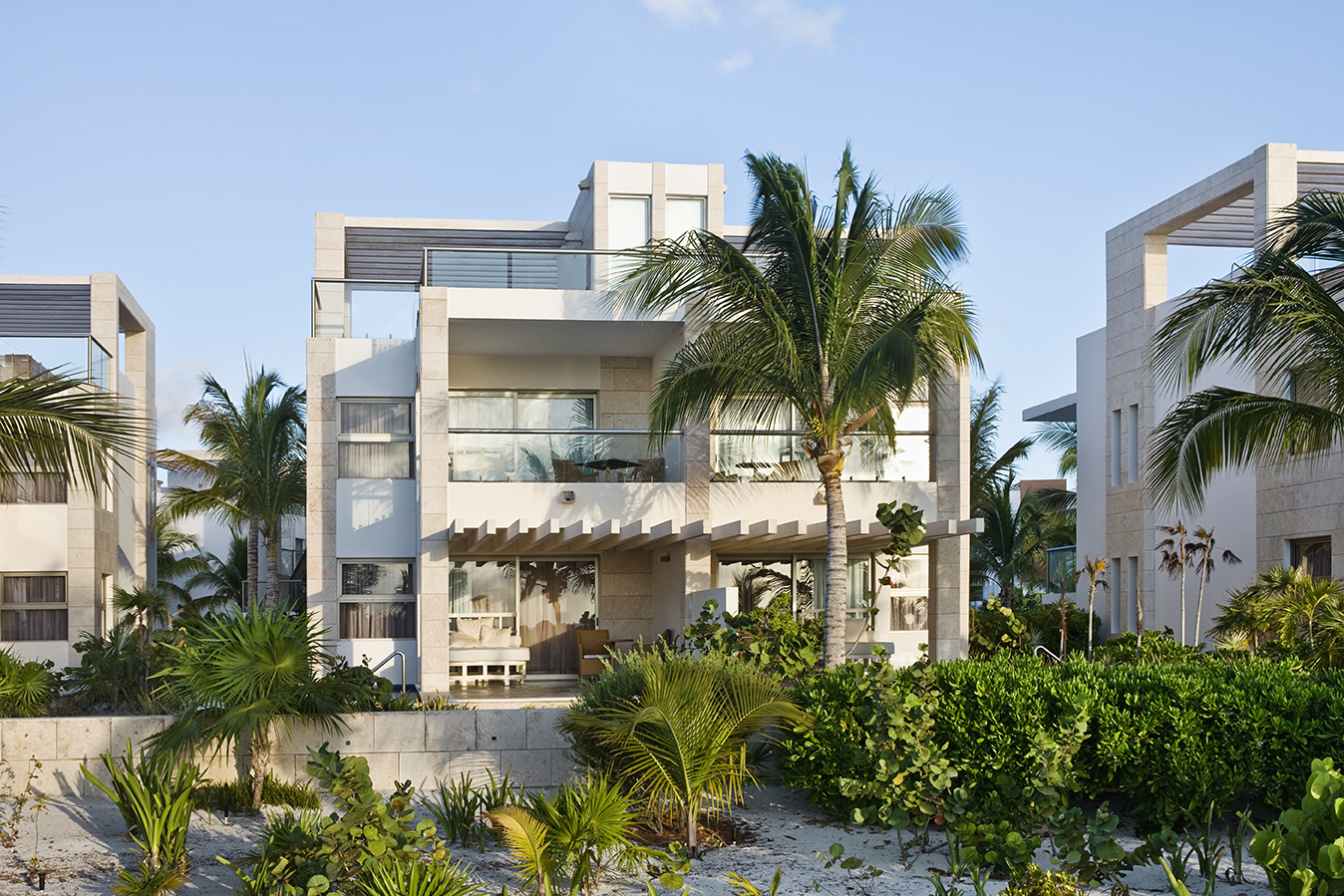 Casita suites exterior view with tropical surroundings