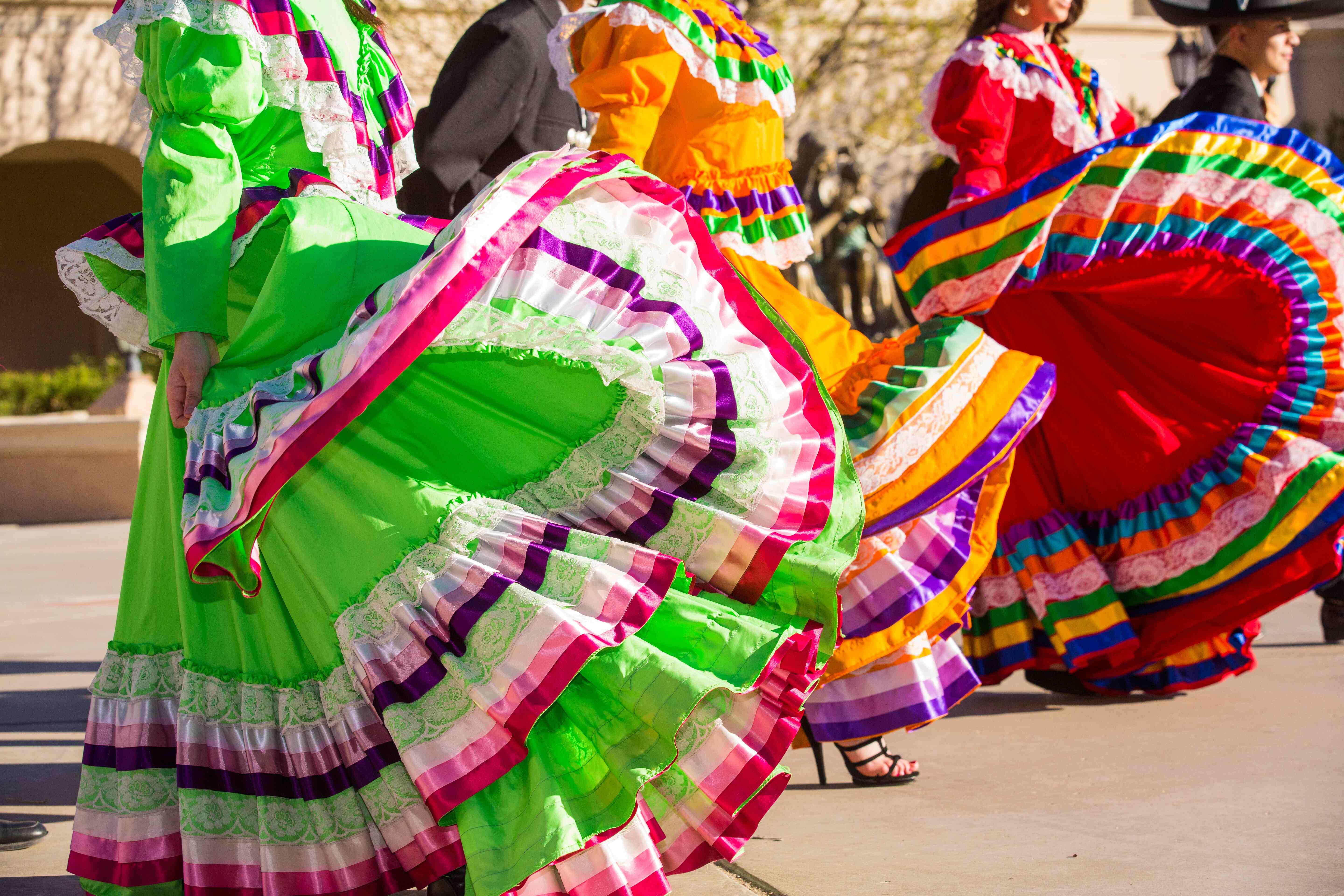 Mexican festivities with brightly colored dresses and lively dancing